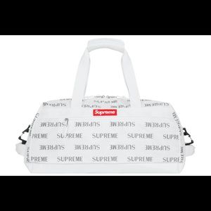White supreme duffel with handles and strap